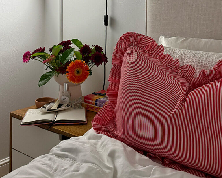 Spases Ruffle scatter cushion on bed